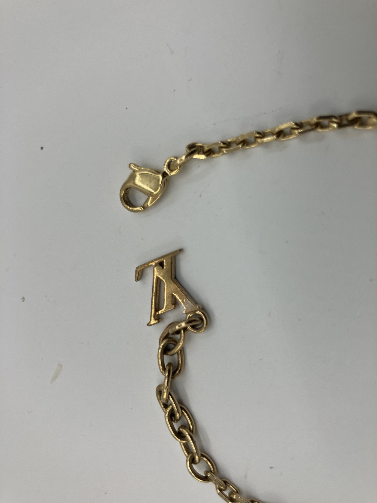 LOUIS VUITTON Collier Gamble bracelet, 18cm around the wrist, gold,