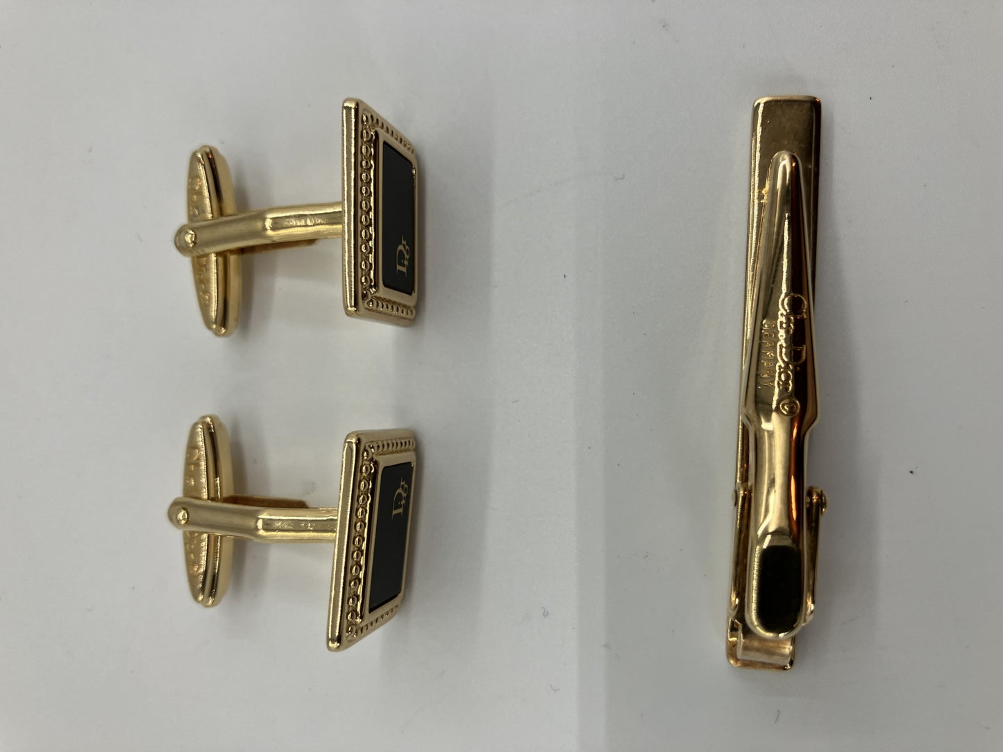 Christian Dior cuff and tie pin set, gold and black, with box,
