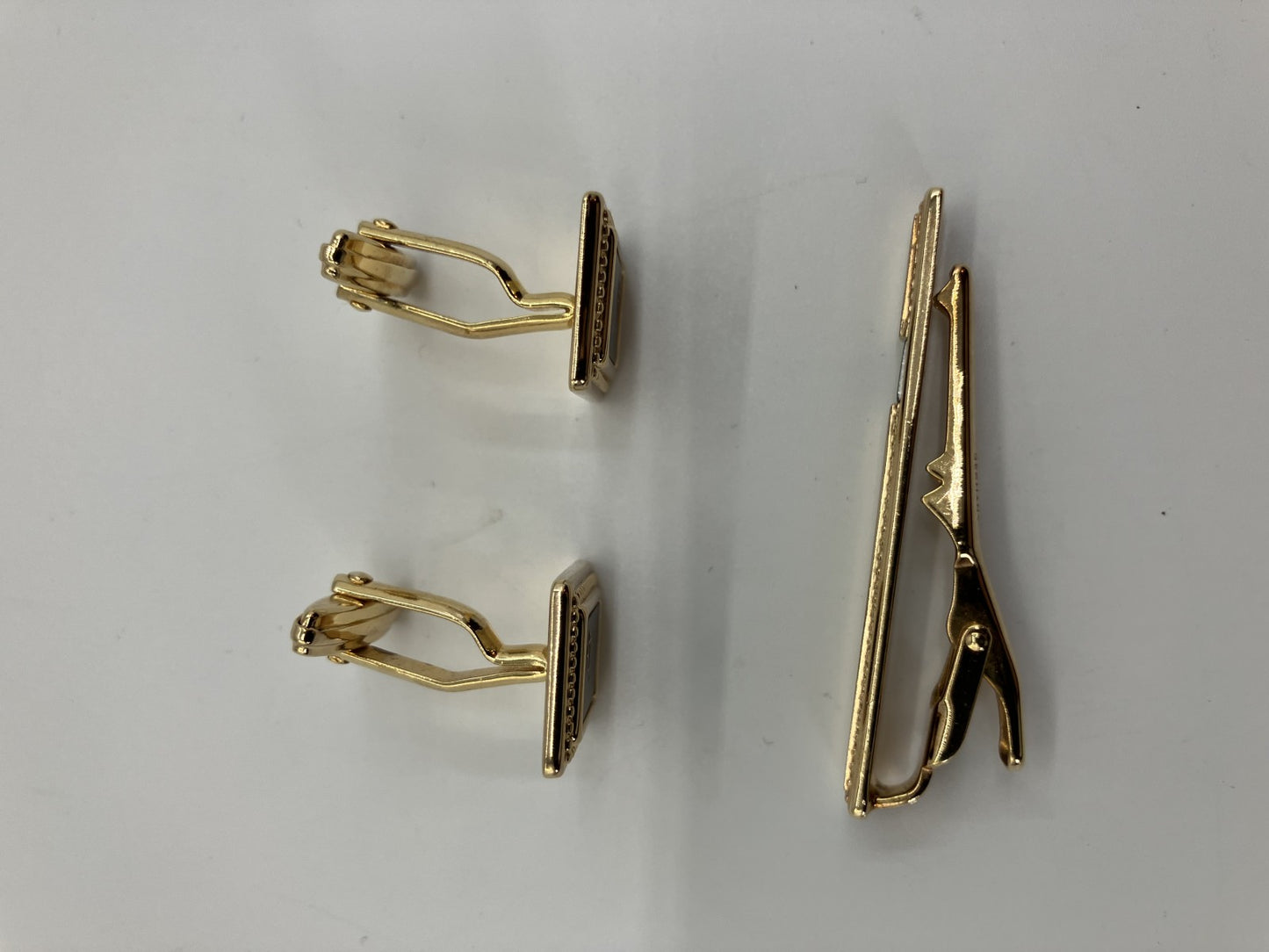 Christian Dior cuff and tie pin set, gold and black, with box,