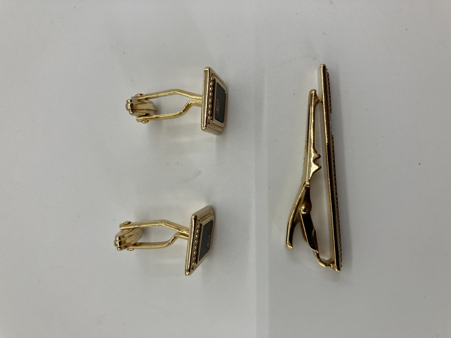 Christian Dior cuff and tie pin set, gold and black, with box,