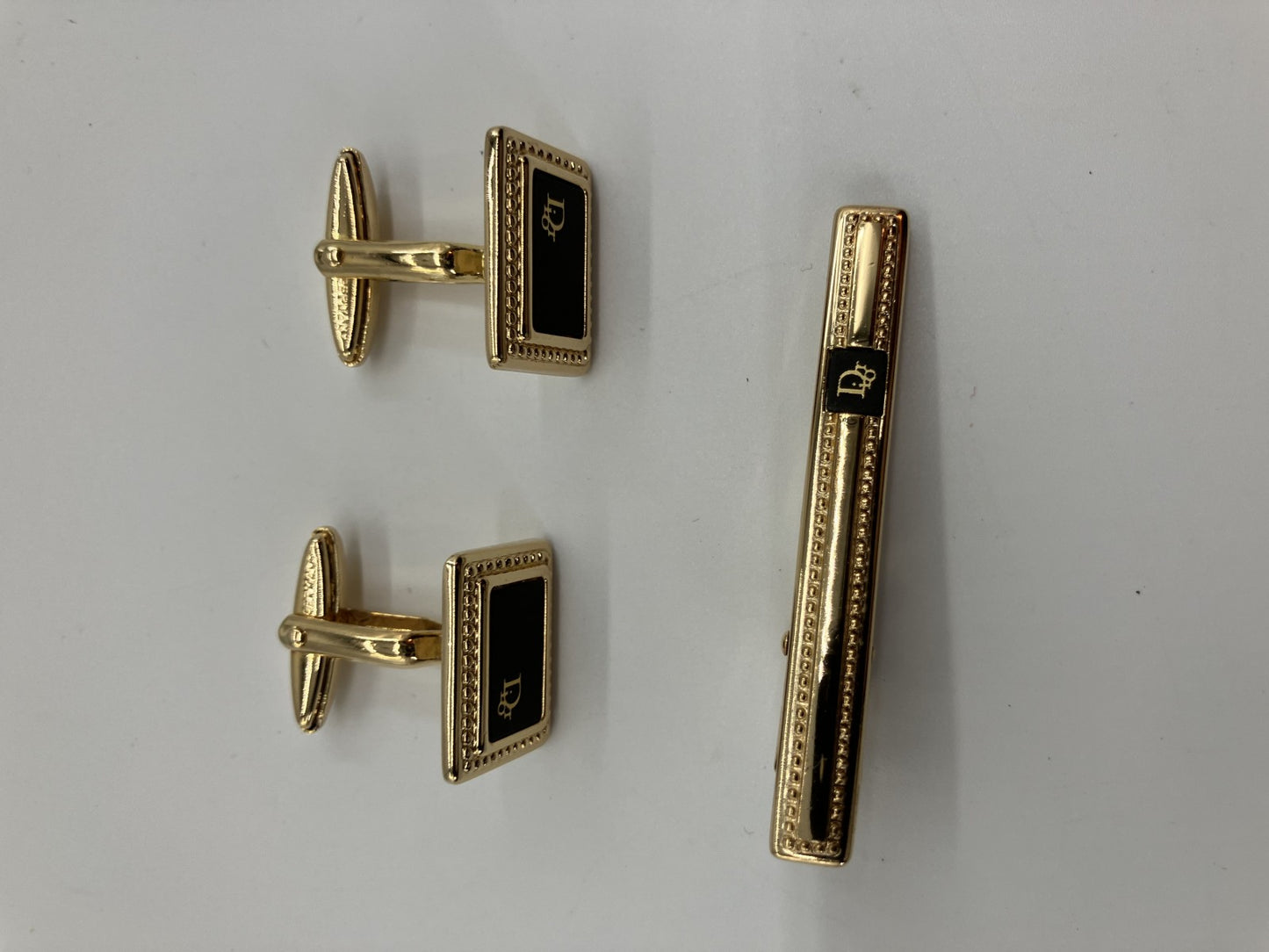 Christian Dior cuff and tie pin set, gold and black, with box,