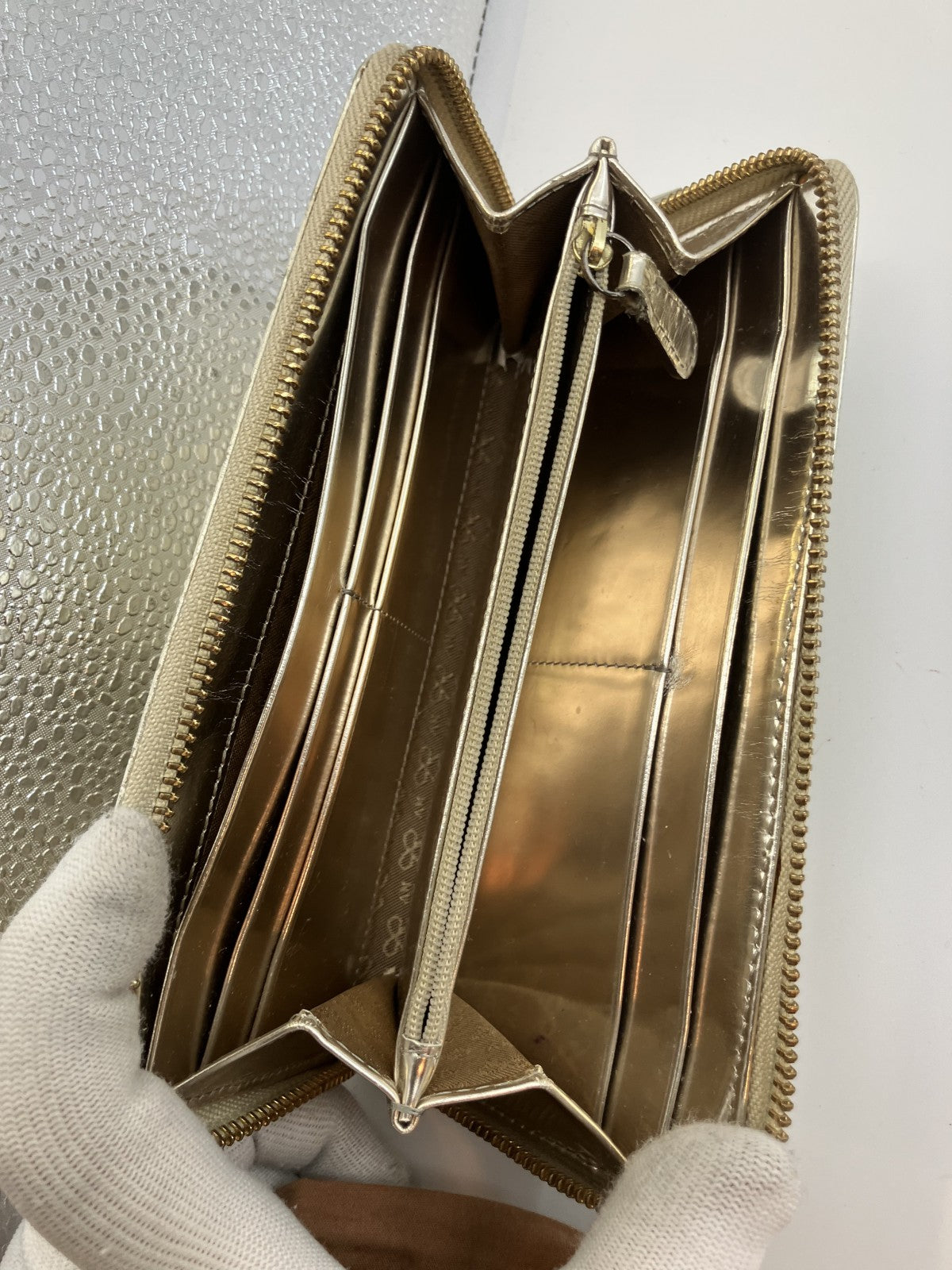 Anya Hindmarch Bow Quilted Zip Around Long Wallet Metallic Gold Patent Leather