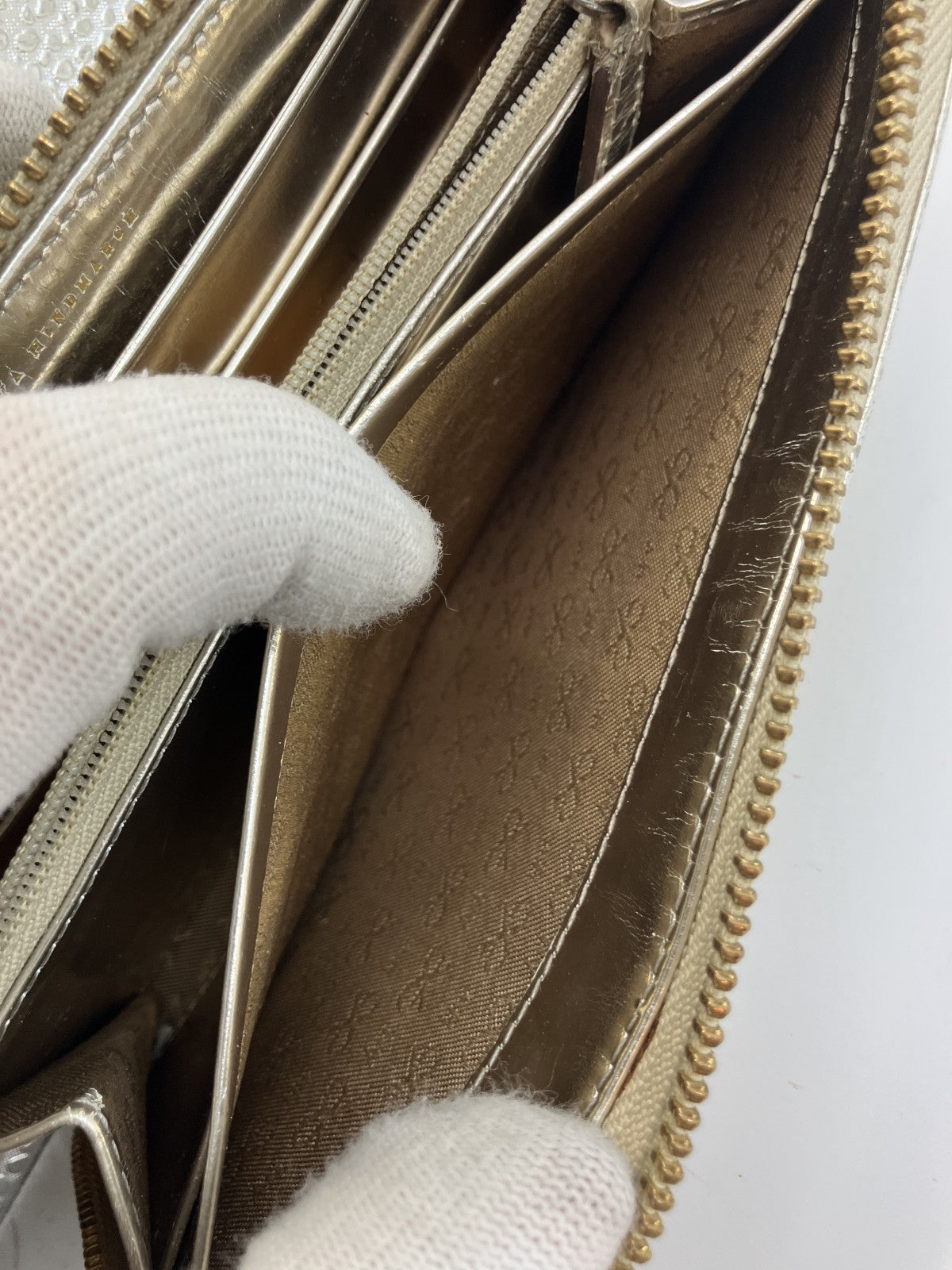 Anya Hindmarch Bow Quilted Zip Around Long Wallet Metallic Gold Patent Leather