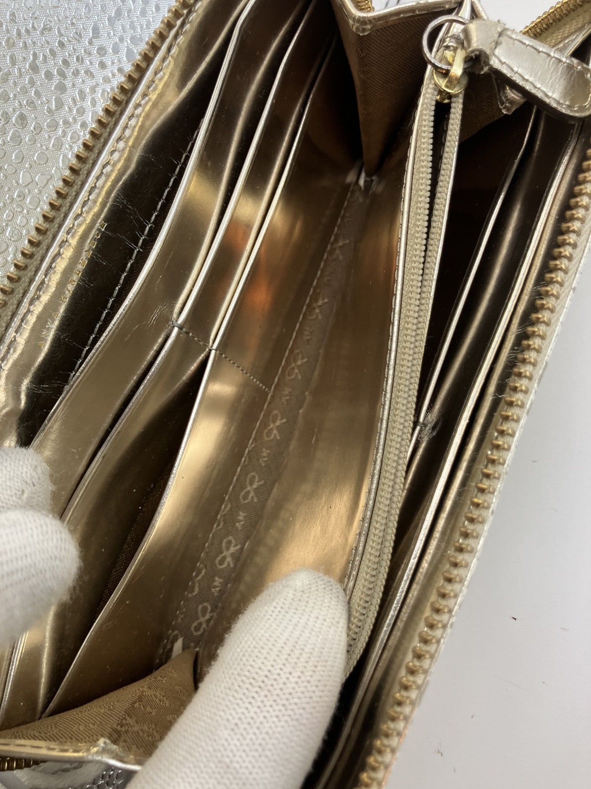 Anya Hindmarch Bow Quilted Zip Around Long Wallet Metallic Gold Patent Leather