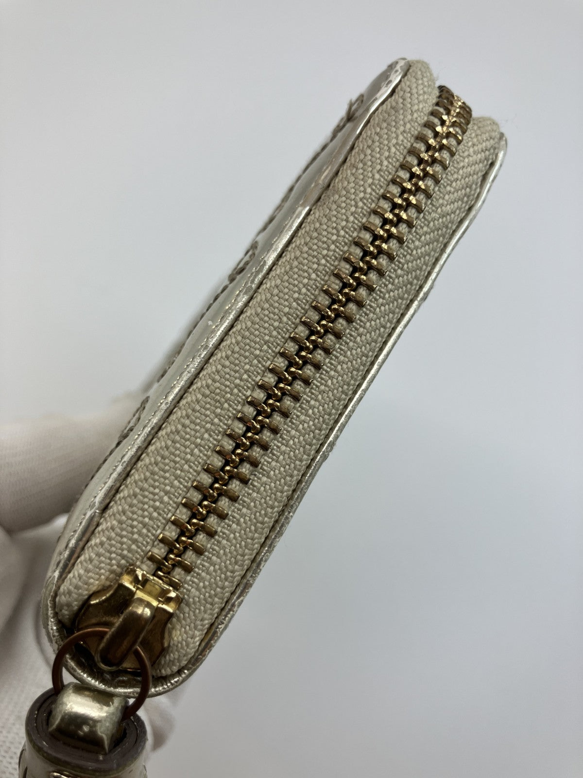 Anya Hindmarch Bow Quilted Zip Around Long Wallet Metallic Gold Patent Leather