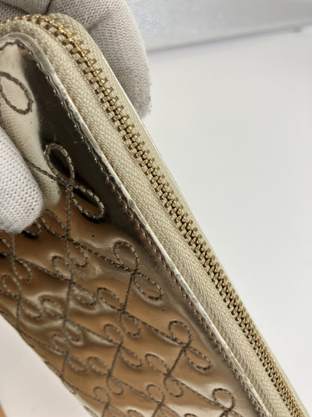 Anya Hindmarch Bow Quilted Zip Around Long Wallet Metallic Gold Patent Leather