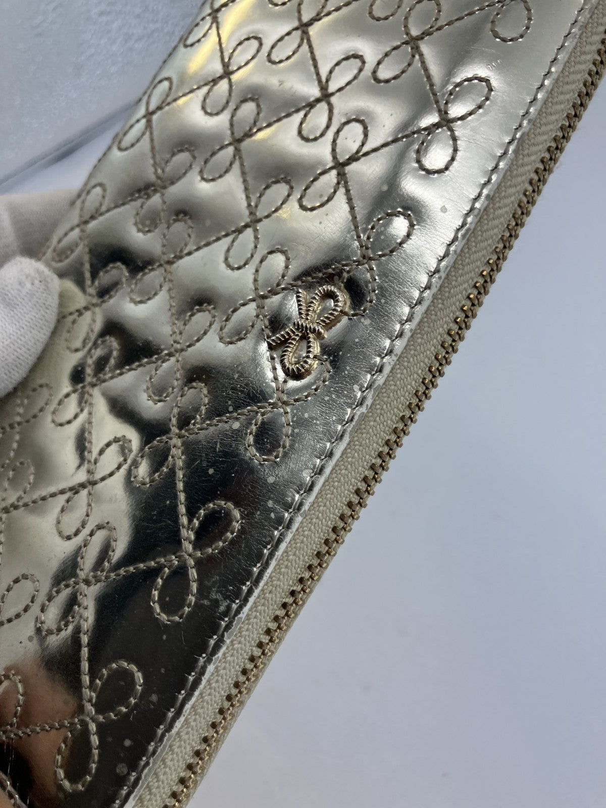 Anya Hindmarch Bow Quilted Zip Around Long Wallet Metallic Gold Patent Leather