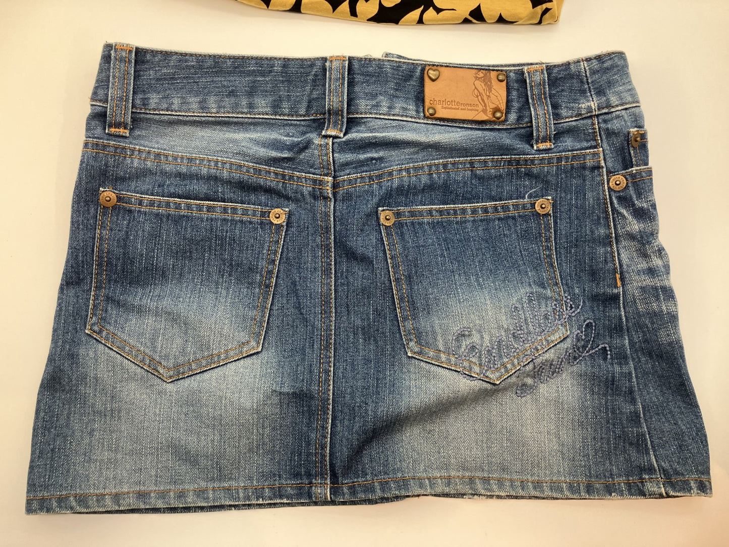 Yellow camisole with cups and denim mini skirt set