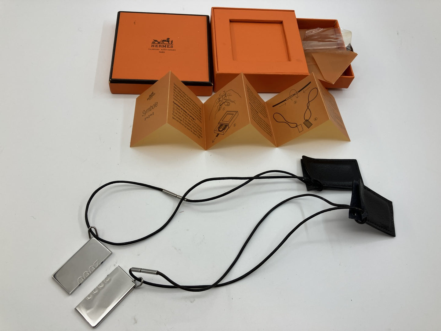 HERMES Symbol Pair Necklace 2000 Silver-Tone Metal Top 4×2cm Black Leather Cord with Box