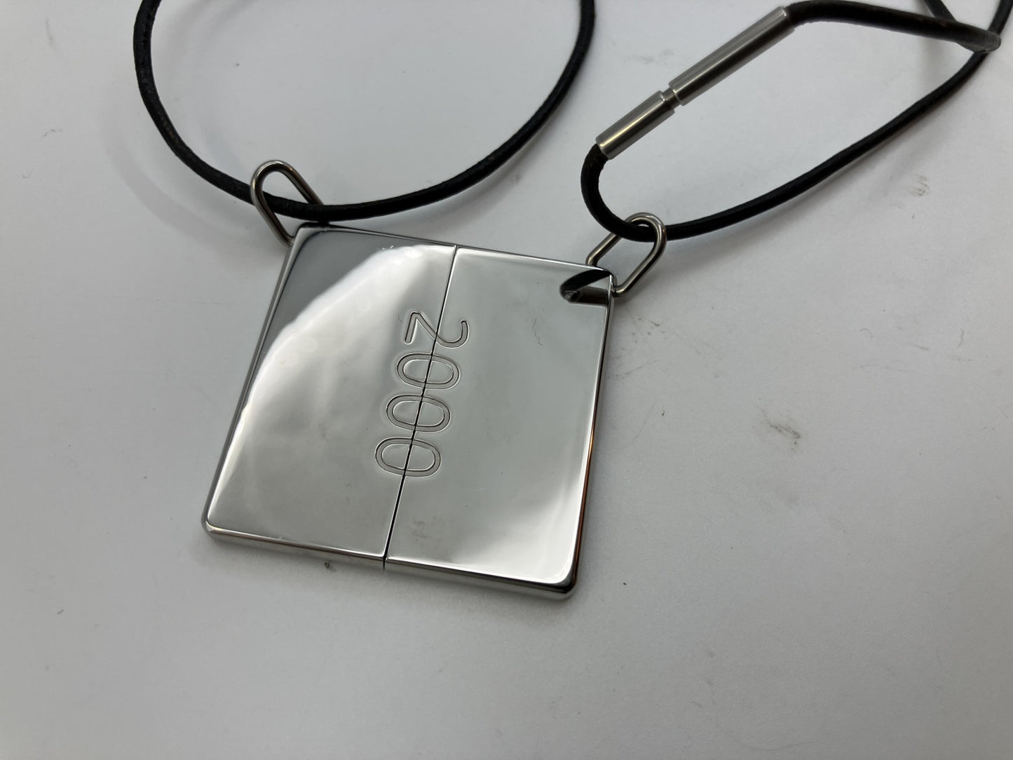 HERMES Symbol Pair Necklace 2000 Silver-Tone Metal Top 4×2cm Black Leather Cord with Box