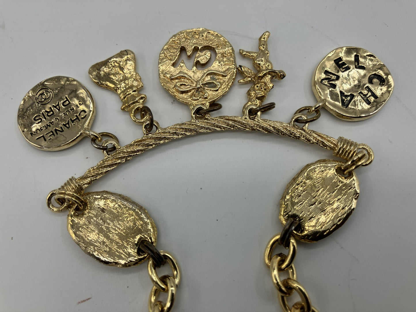 CHANEL Vintage Charm Necklace Gold Tone Coin Angel Perfume Pendant