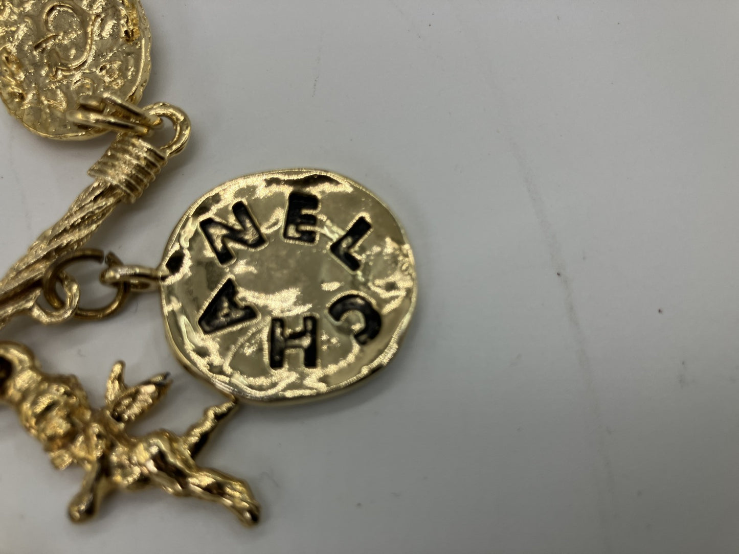 CHANEL Vintage Charm Necklace Gold Tone Coin Angel Perfume Pendant