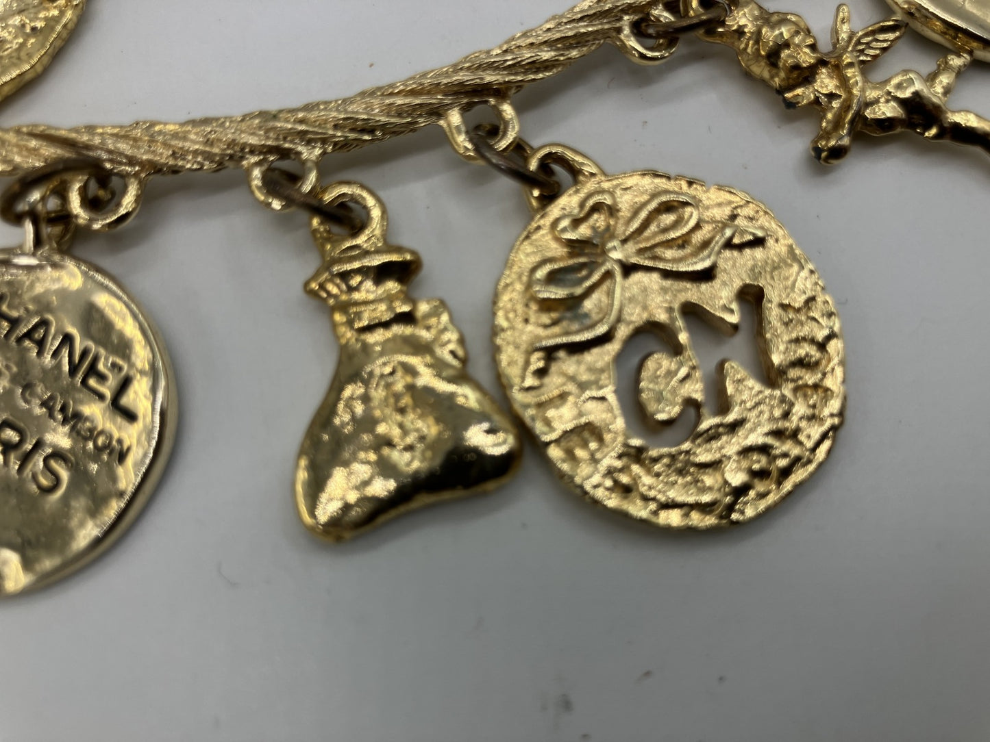 CHANEL Vintage Charm Necklace Gold Tone Coin Angel Perfume Pendant