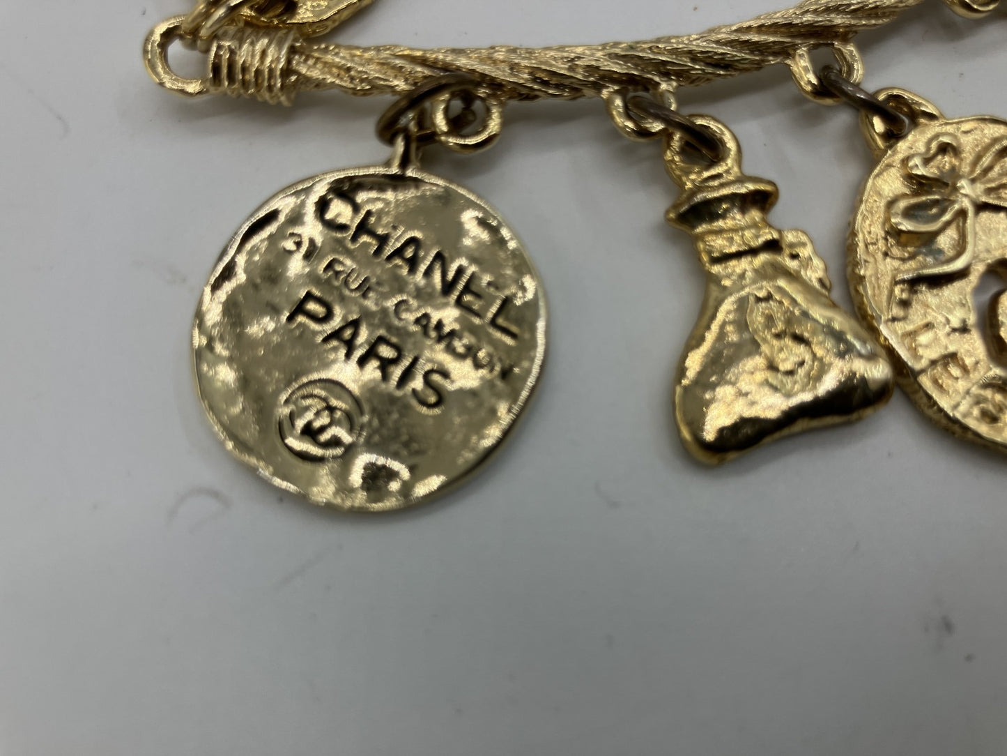 CHANEL Vintage Charm Necklace Gold Tone Coin Angel Perfume Pendant